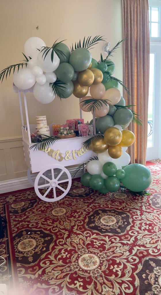 Candy-Cart-Rental-with-Multi-Coloured-Balloon-Decor