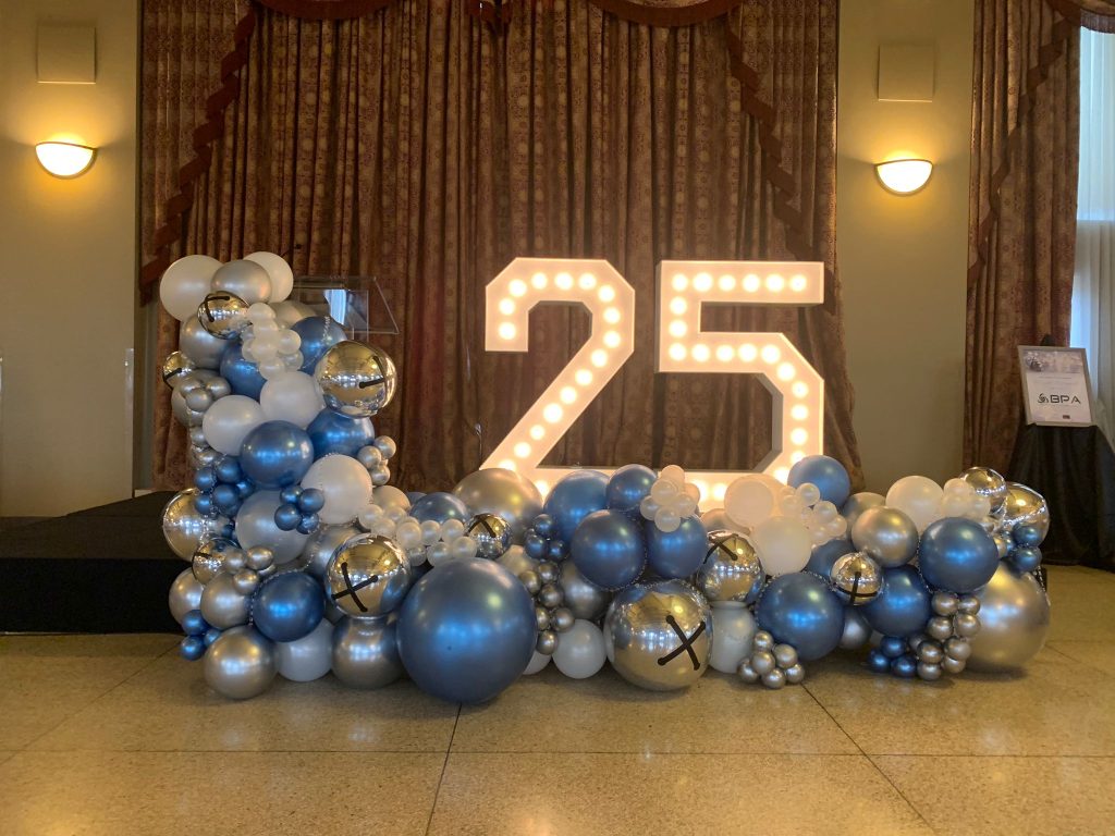 Multi-Coloured-Balloon-Decor-with-Bright-Marquee-Numbers-Party-Rental-Guelph